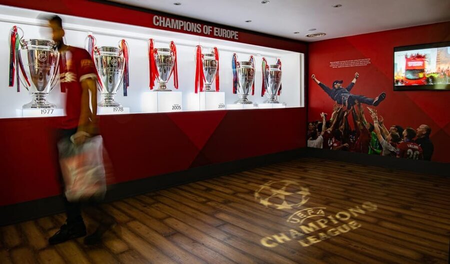 From London: Liverpool FC Stadium & Museum Rail Day Tour - Liverpool FC Story museum: multimedia handset in real matchday context