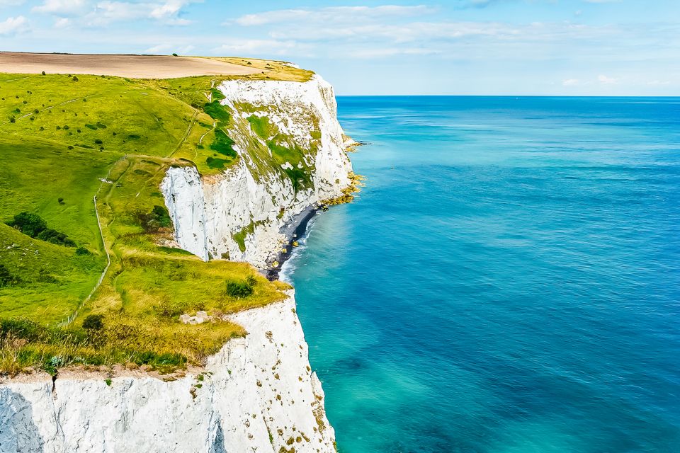 From London: White Cliffs of Dover and Canterbury Day Trip - Dover Seafront: A Sea-Level Photo Stop That Changes the Perspective